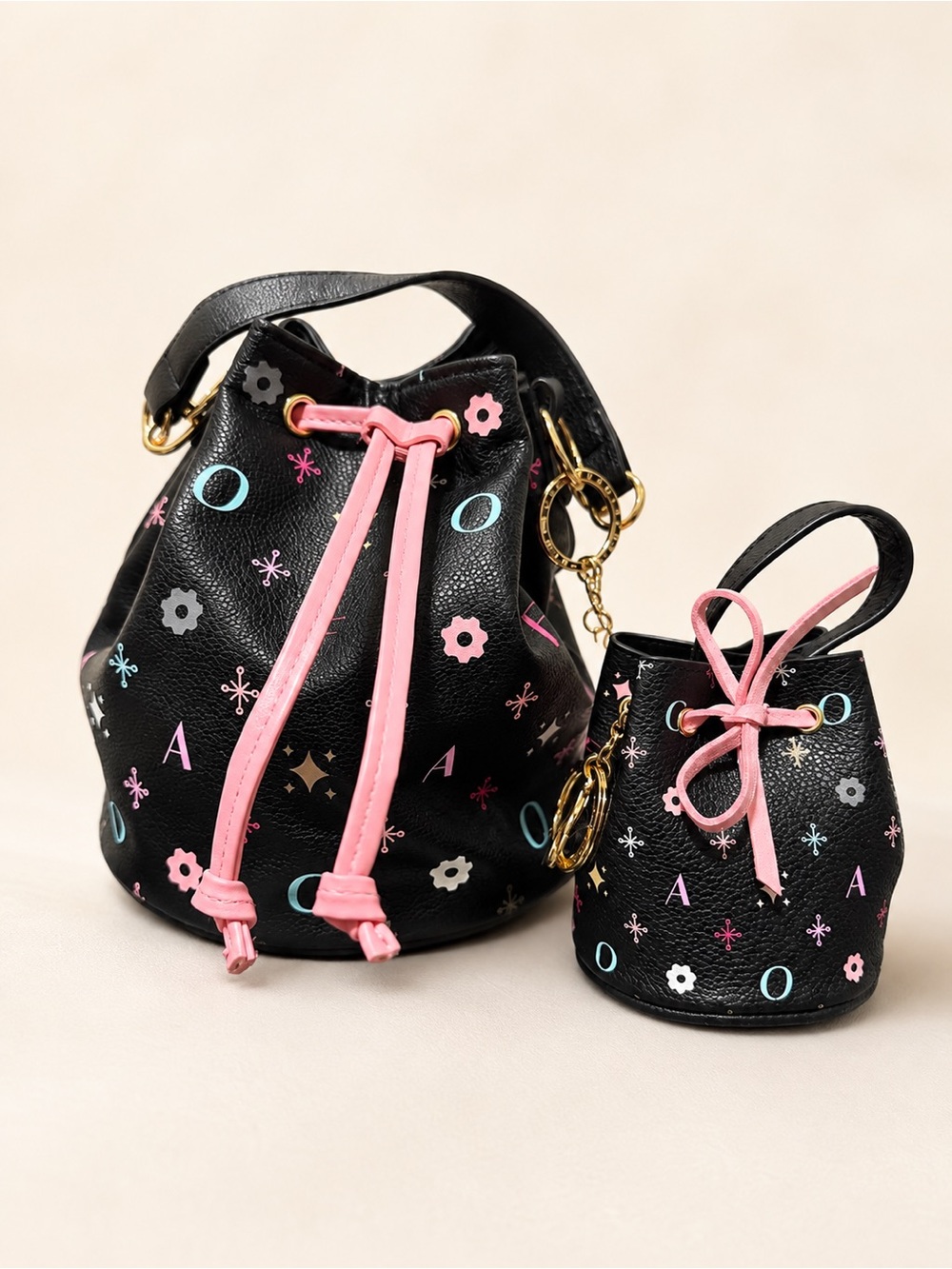 Fao Schwarz Kids Black Mini Drawstring Bucket Bag with Pink Accents